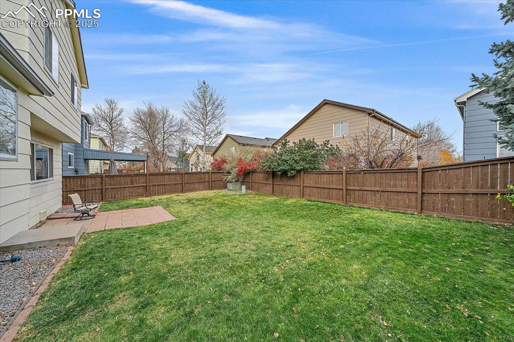 Image 26 of 34: Fenced In Backyard, Privace Fence, Patio