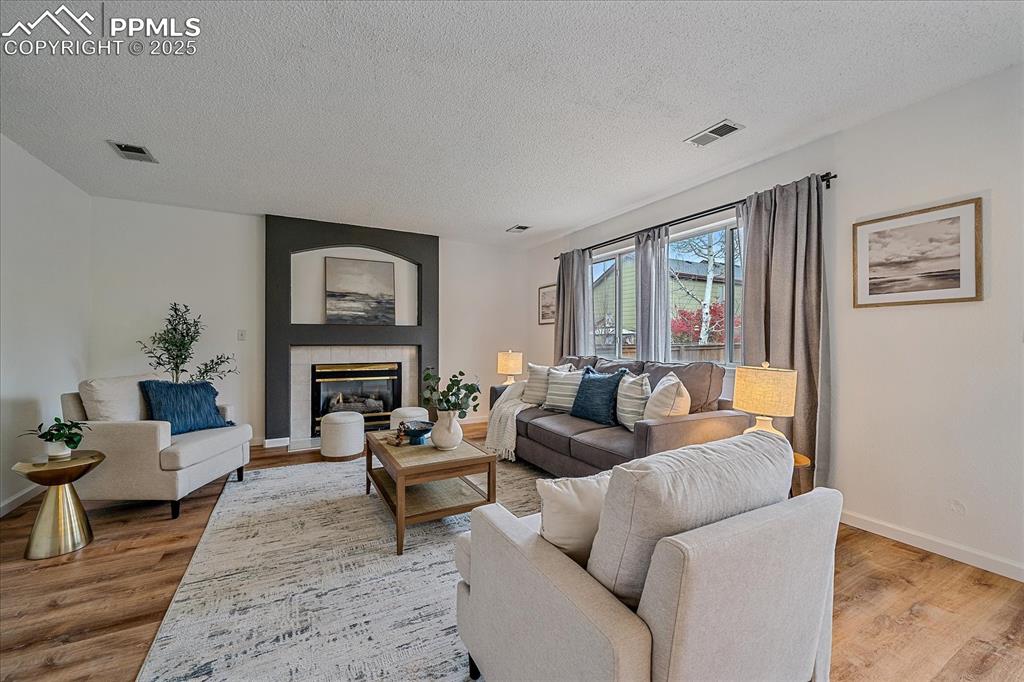 Image 5 of 34: Family Room with Fireplace