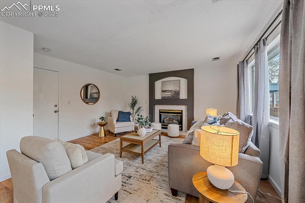 Image 6 of 34: Family Room with Fireplace