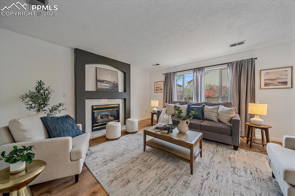 Image 7 of 34: Family Room with Fireplace