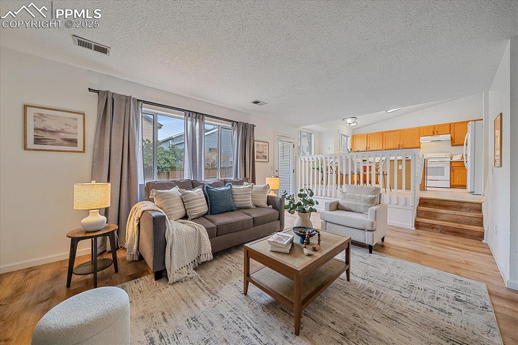 Image 8 of 34: Family Room with Fireplace