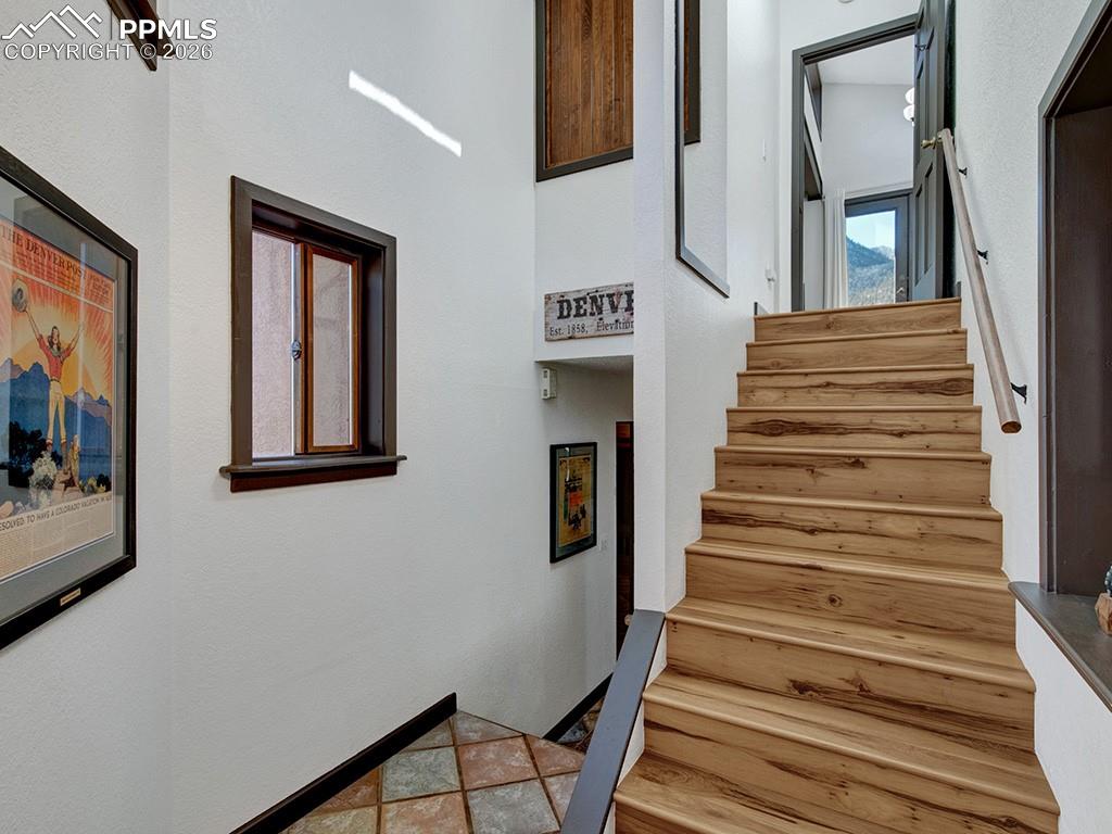 Image 24 of 39: Hallway to primary becd