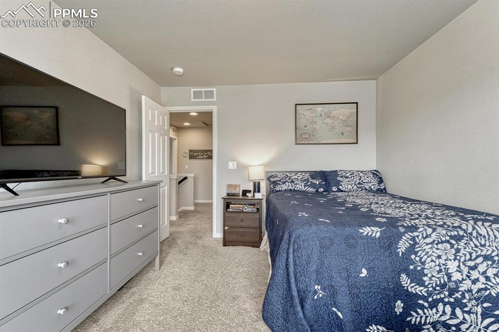 Image 28 of 50: View of the Hallway from Upper Level Bedroom #2.