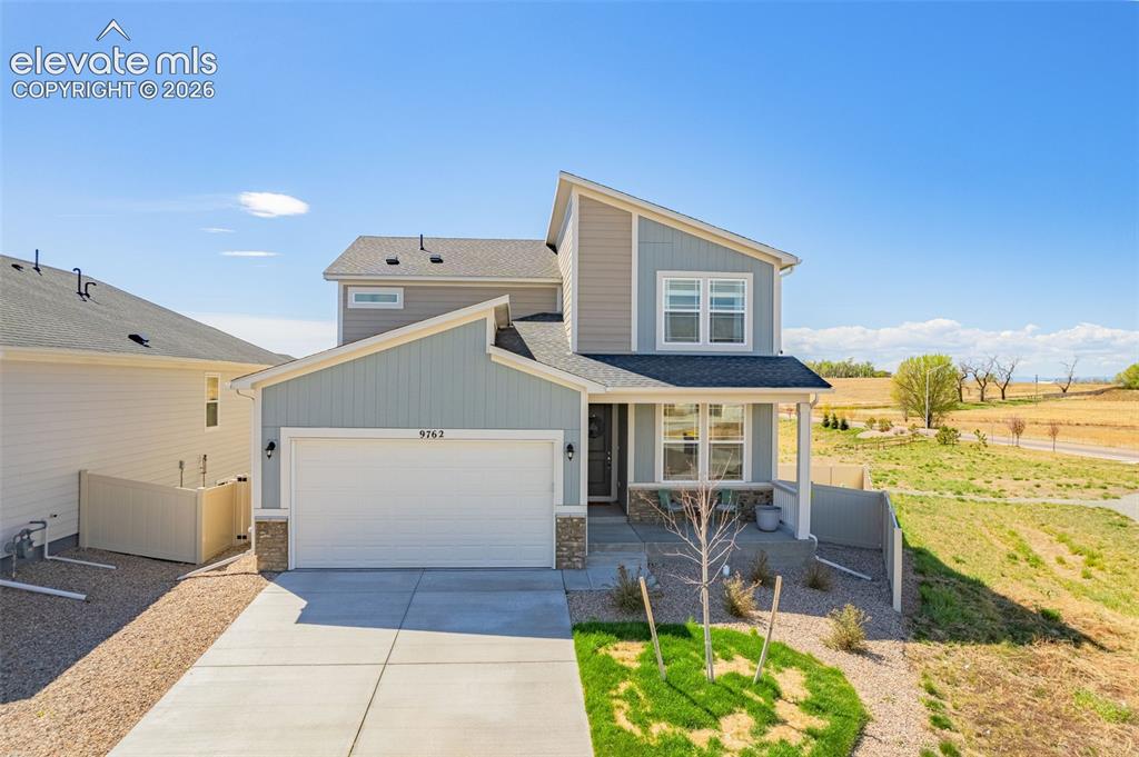 Image 35 of 50: Contemporary exterior featuring a two-story design and attached two-car gar
