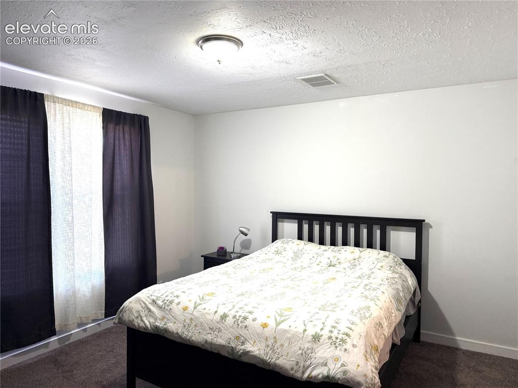 Image 16 of 39: Bedroom