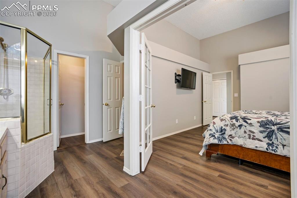 Image 20 of 43: Primary bedroom with bath and walk in closet