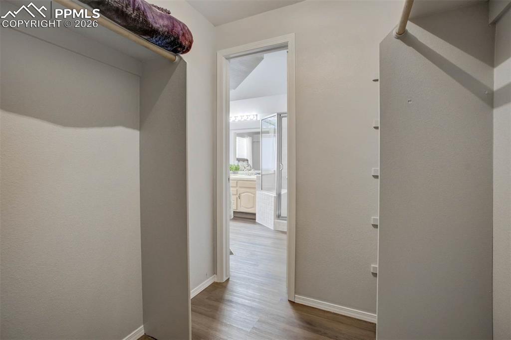 Image 24 of 43: Walk in closet 