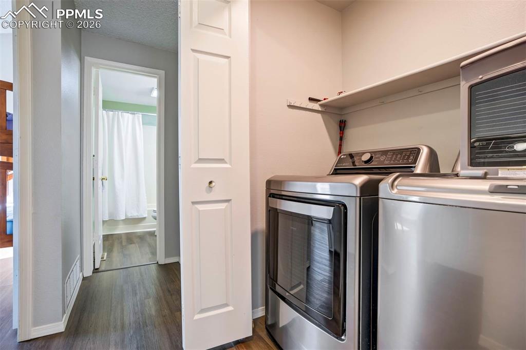 Image 32 of 43: Laundry area on main floor