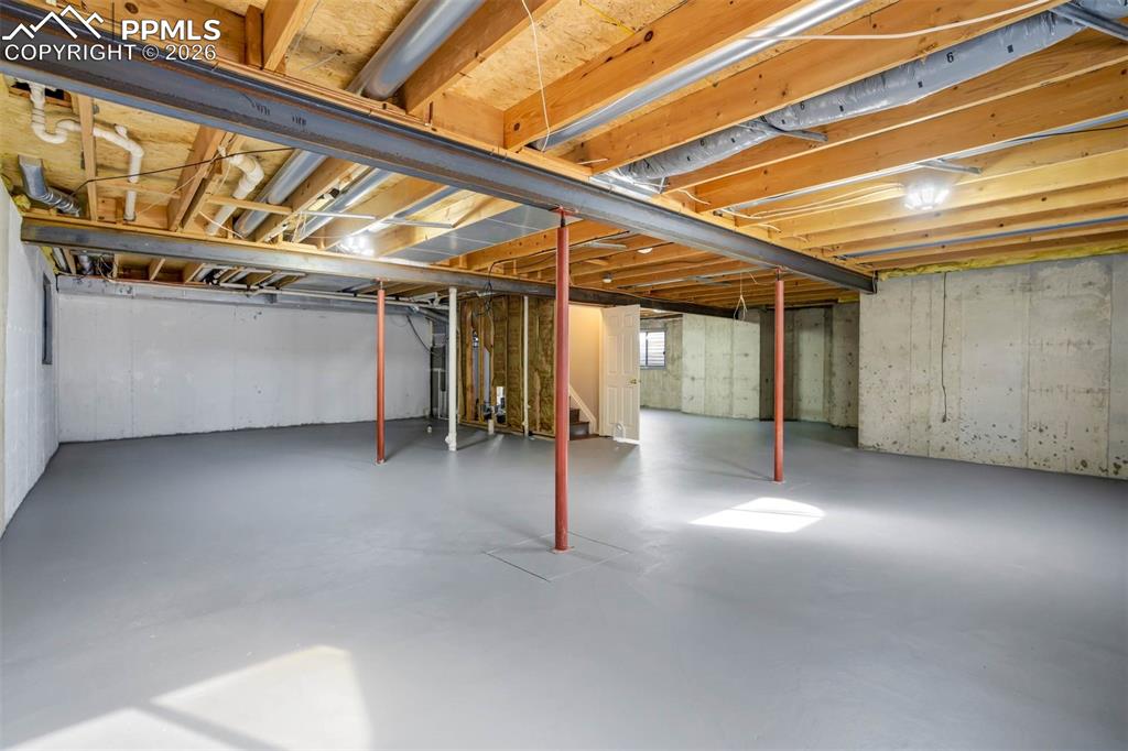Image 35 of 43: Unfinished basement with rough in 
