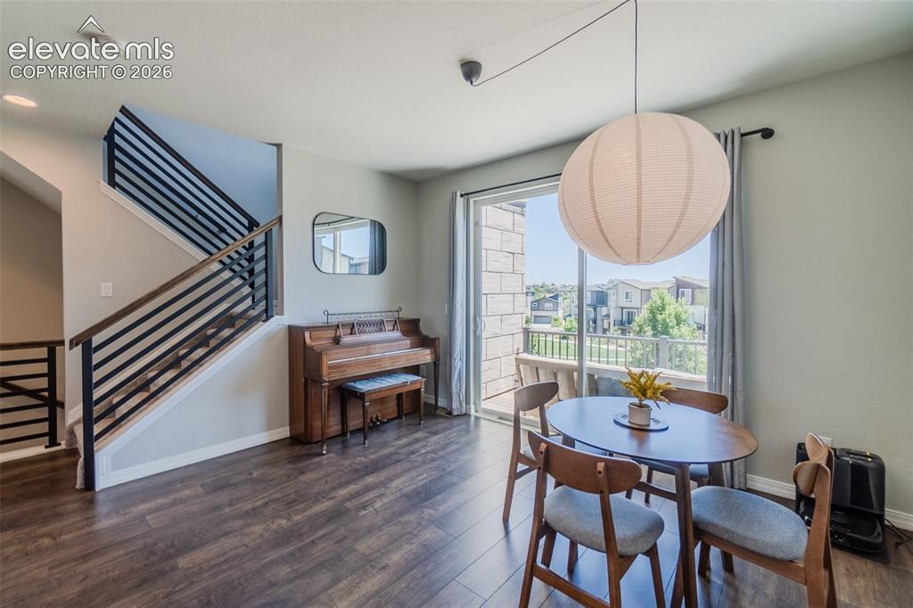 Image 11 of 47: Dining area with access to balcony