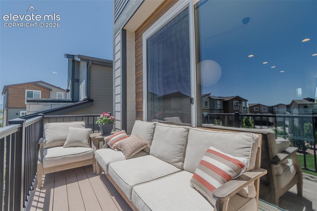 Image 14 of 47: Private balcony overlooking green space