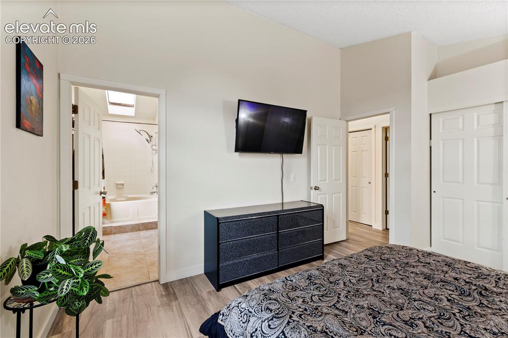 Image 9 of 15: Primary bedroom on upper level
