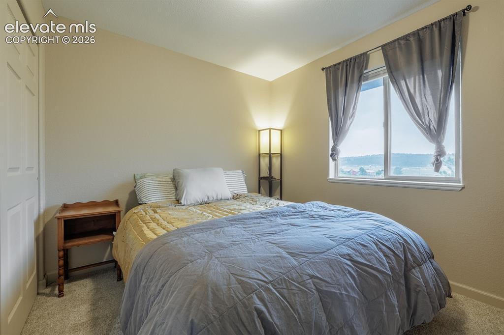 Image 15 of 28: Bedroom