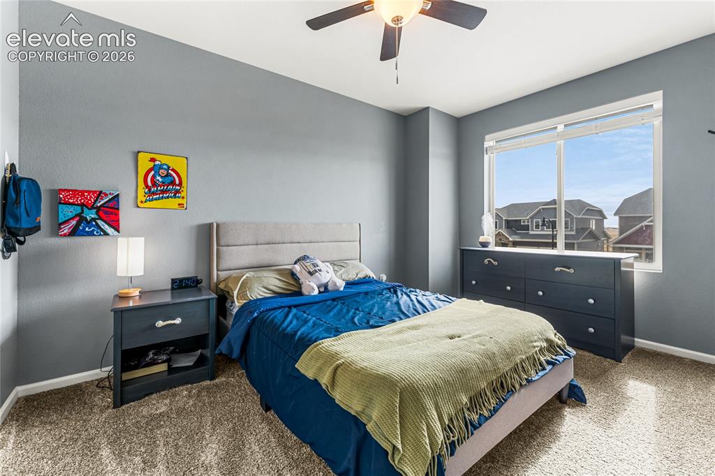 Image 21 of 32: Open-concept living space featuring wood-finish flooring, recessed ceiling