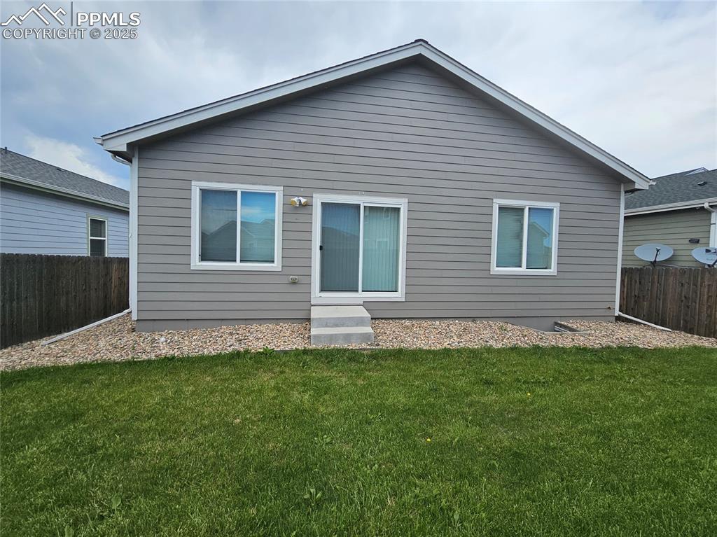 Image 31 of 35: View of rear view of property