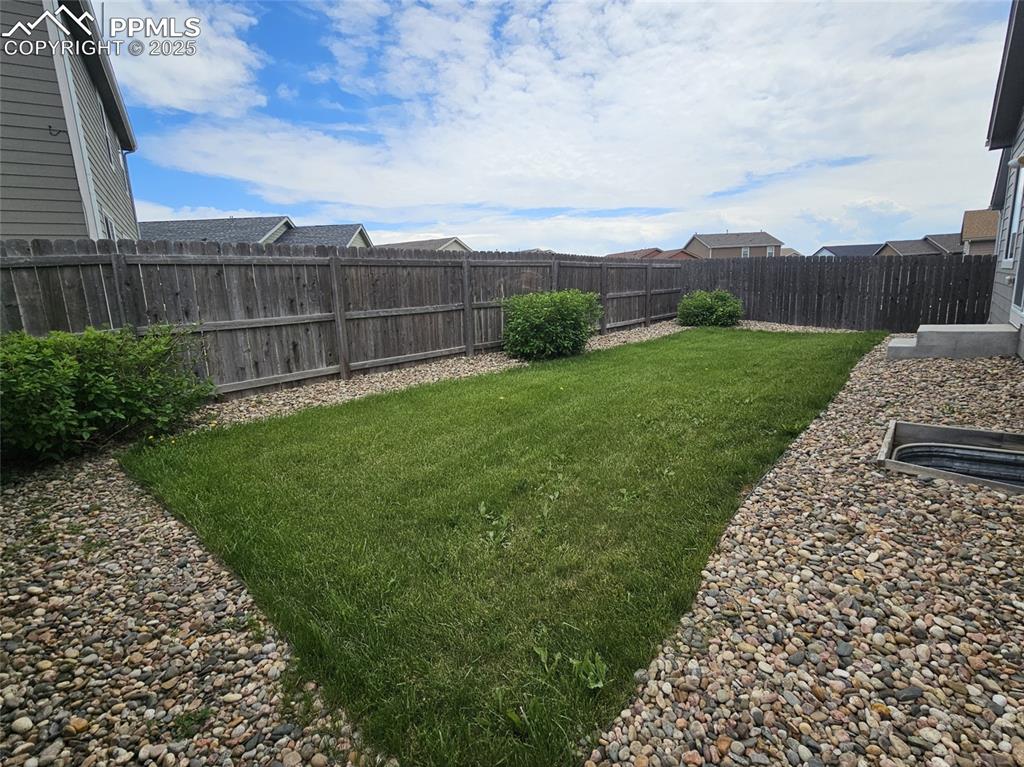 Image 33 of 35: View of backyard