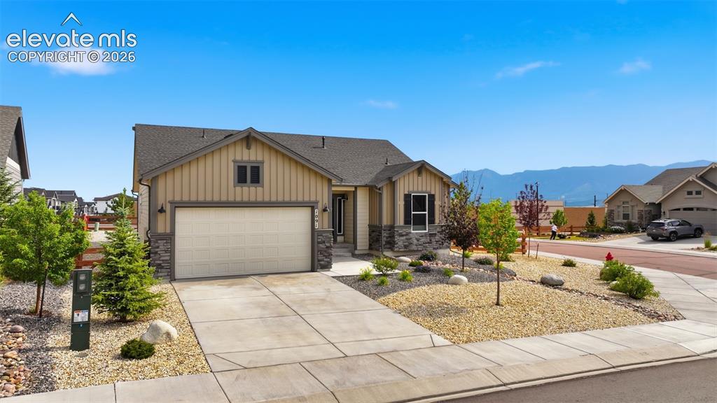 Image 2 of 33: Gorgeous landscaping and beautiful exterior!