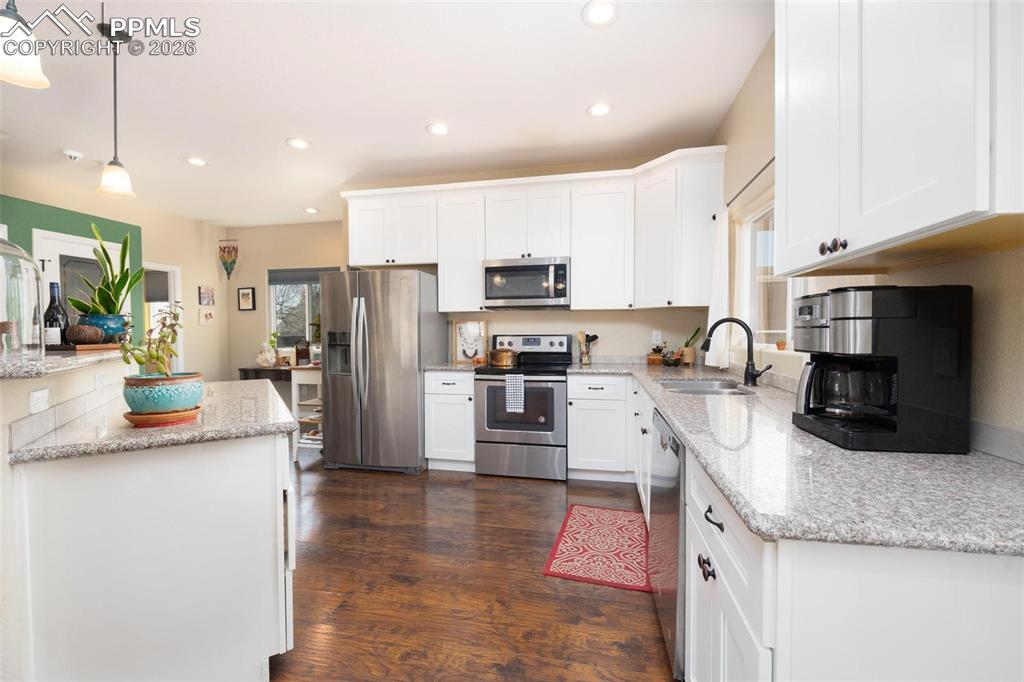 Image 6 of 26: Spacious Kitchen with Breakfast bar island