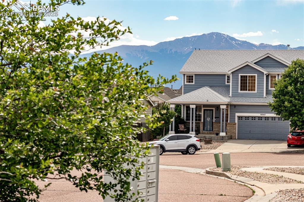 Image 25 of 26: Beautiful Pikes Peak Views from the Front Yard!