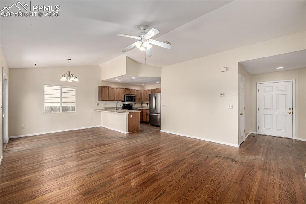 Image 5 of 26: Spacious and open, the living space is perfect for entertaining or a cozy n