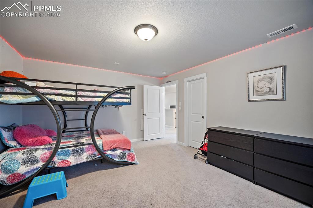 Image 32 of 50: Bedroom