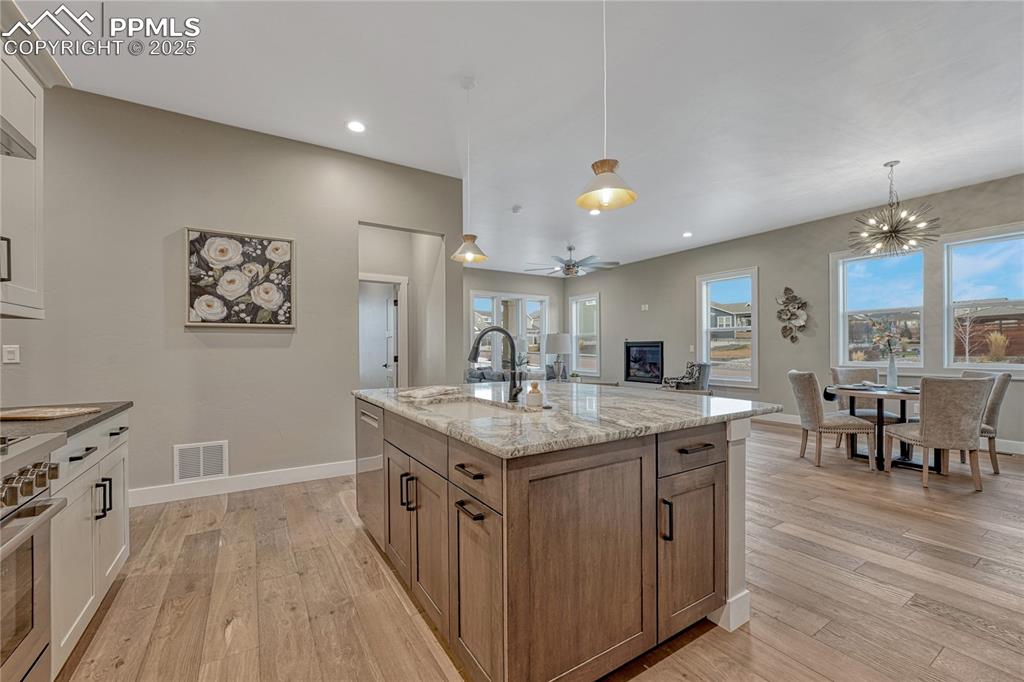 Image 10 of 50: Kitchen- Island has additional storage