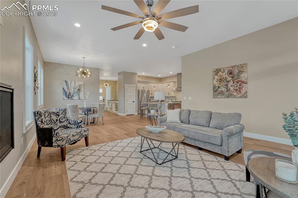 Image 16 of 50: Main level- Living Room- w Ceiling Fan