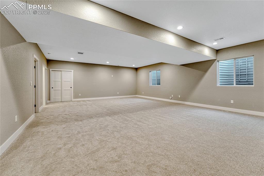 Image 29 of 50: Basement- Family Room, Media Room, Playroom, workout room, etc.