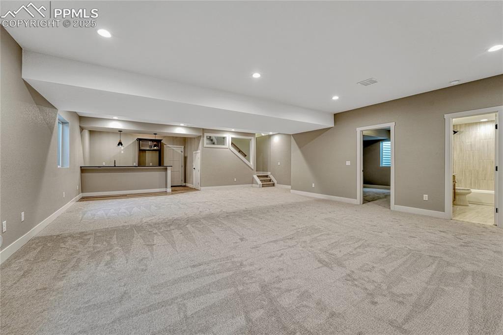 Image 31 of 50: Basement- Family Room, Media Room, Playroom,
