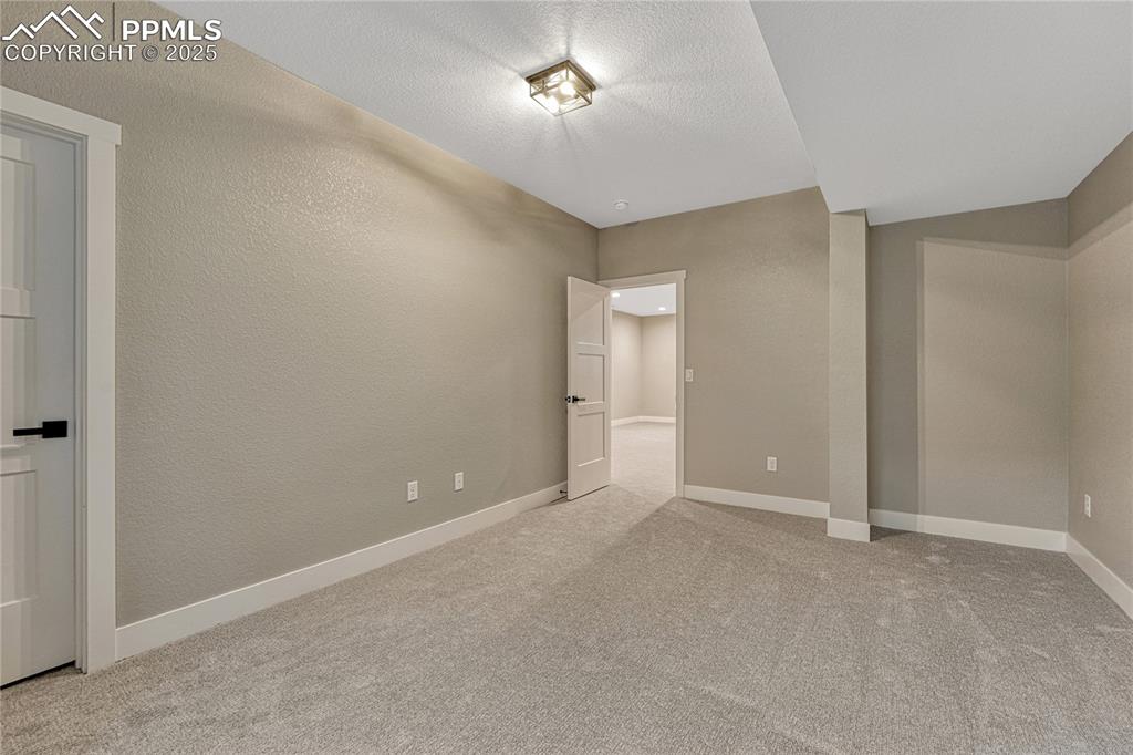 Image 37 of 50: Basement Bedroom