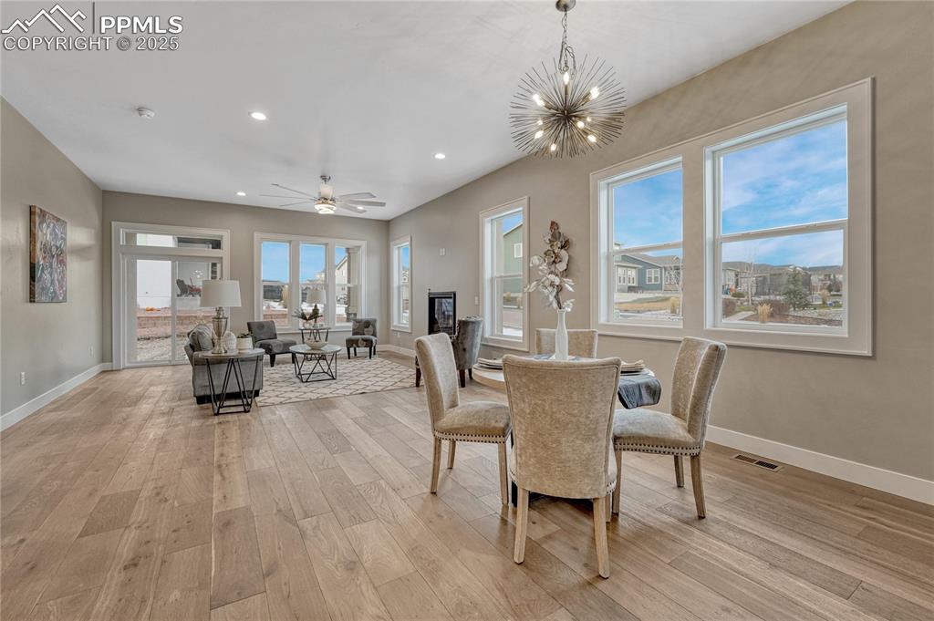 Image 4 of 50: Main Level- Living Room & Dining Area