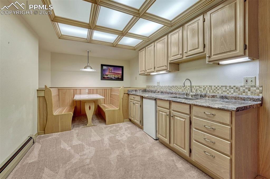 Image 36 of 46: Mini kitchen in the basement. 