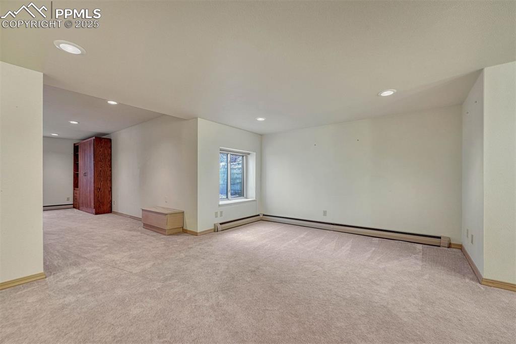 Image 37 of 46: Spacious Rec room in the basement.