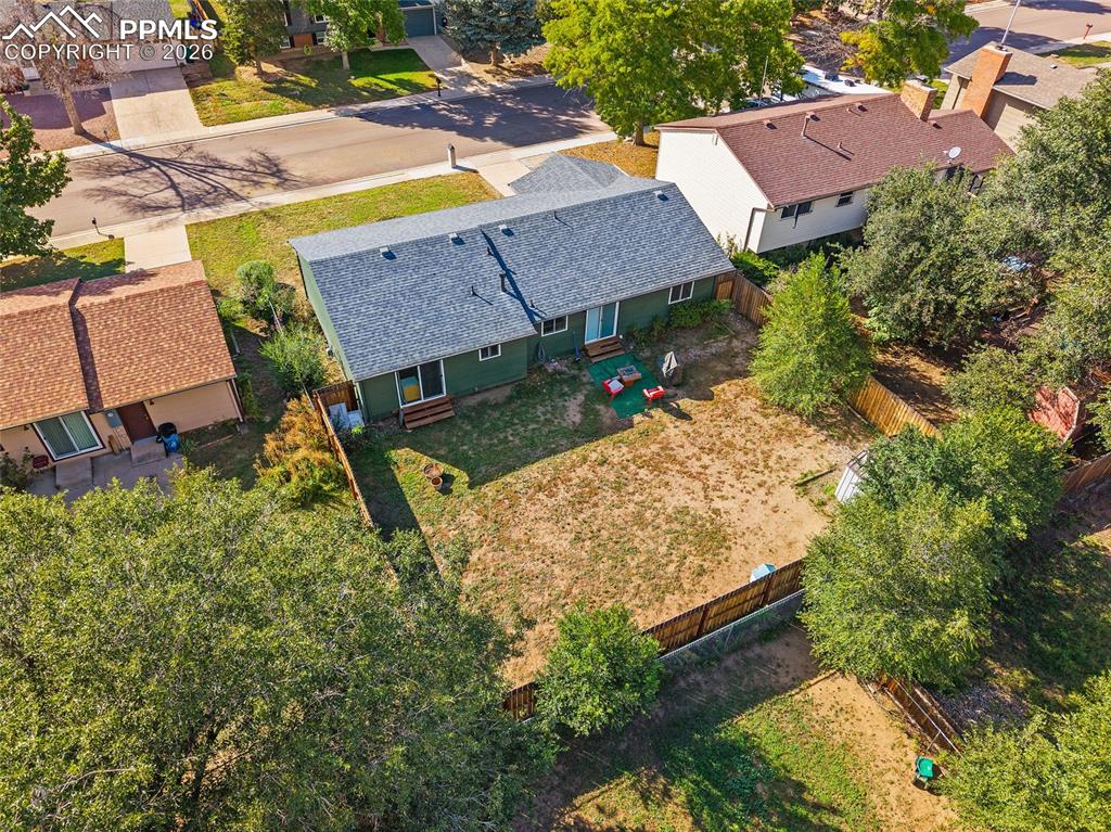 Image 32 of 38: Aerial view of the back of the house