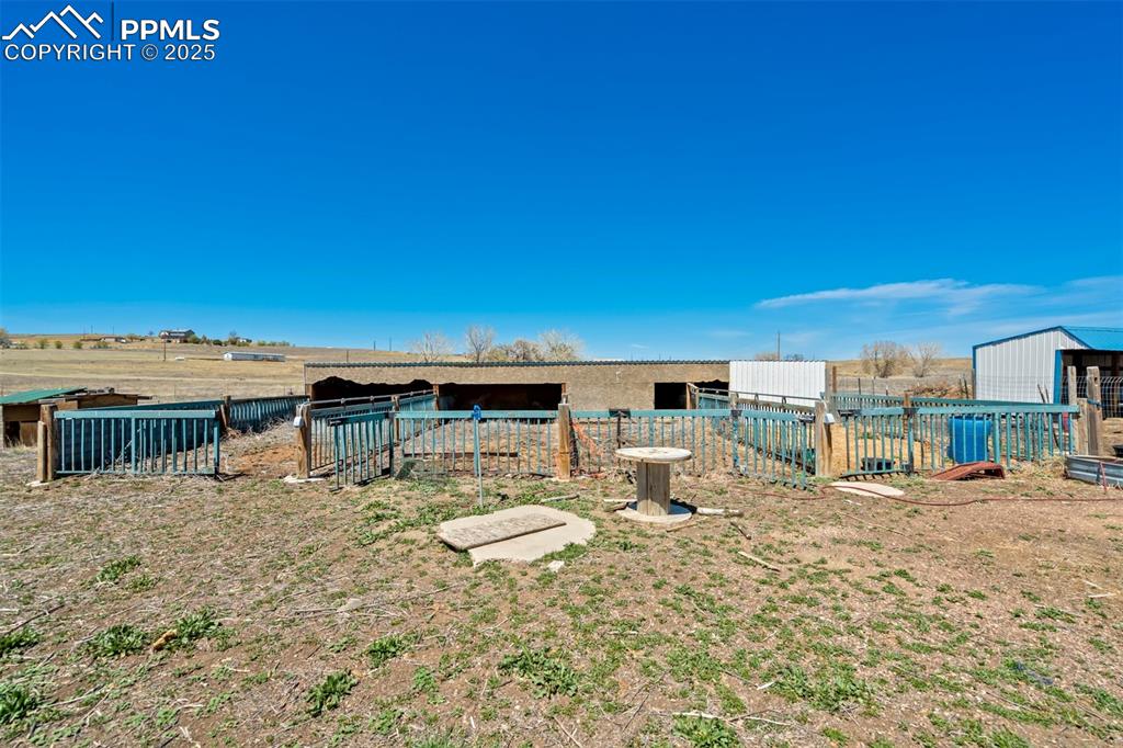 Image 41 of 50: View of yard with fence