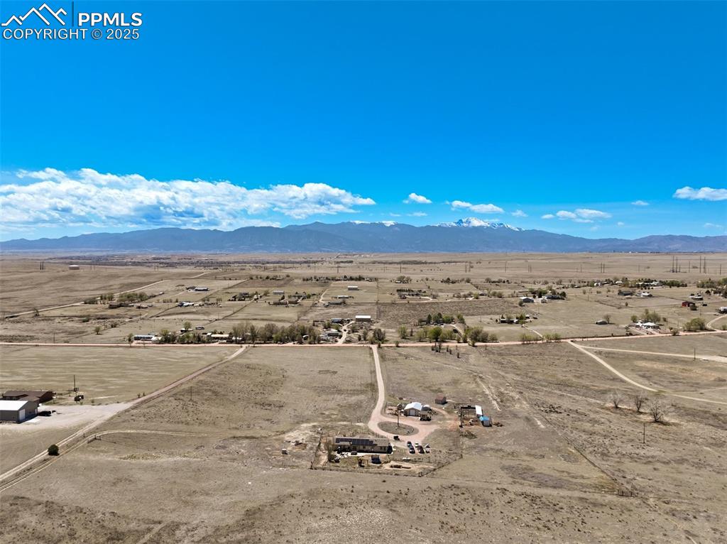 Image 49 of 50: Aerial view featuring a rural view, a mountain view, and view of desert
