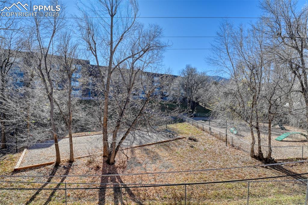 Image 27 of 31: View of yard with a mountain view