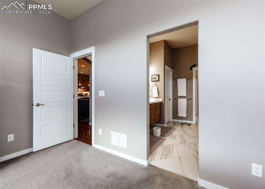 Image 25 of 50: Master Bedroom