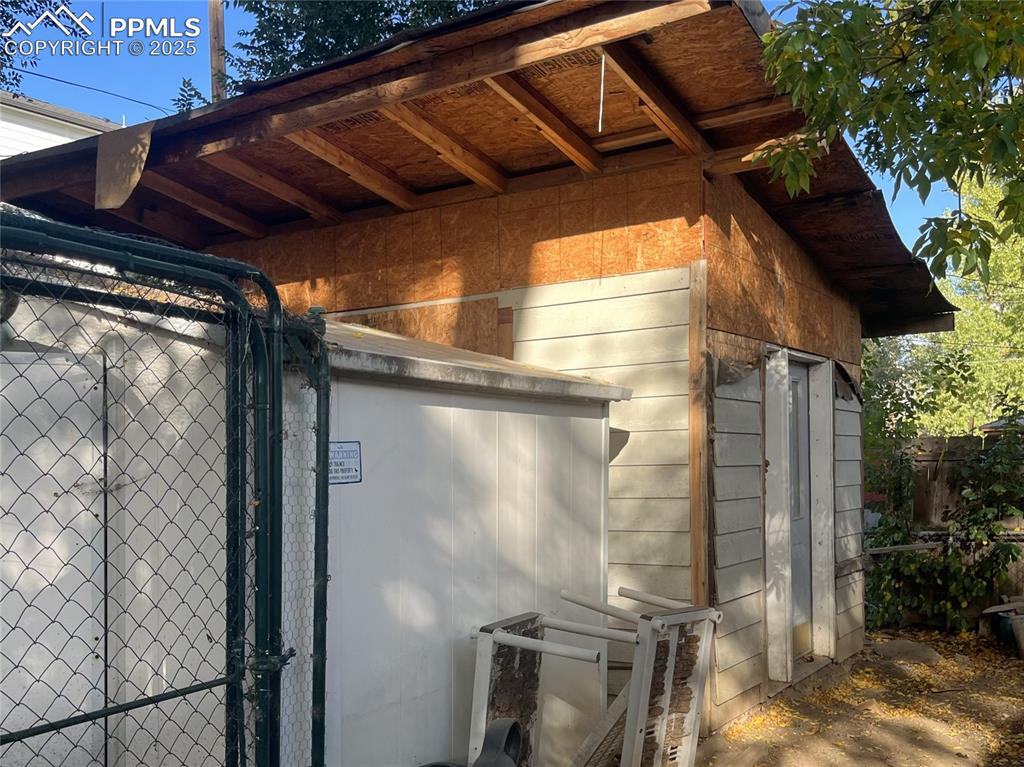 Image 19 of 20: Two storage sheds - east side.
