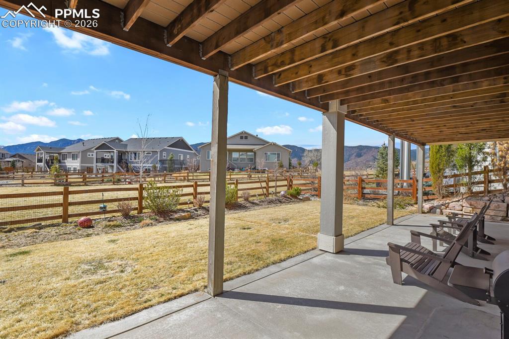 Image 43 of 50: Lower level covered patio