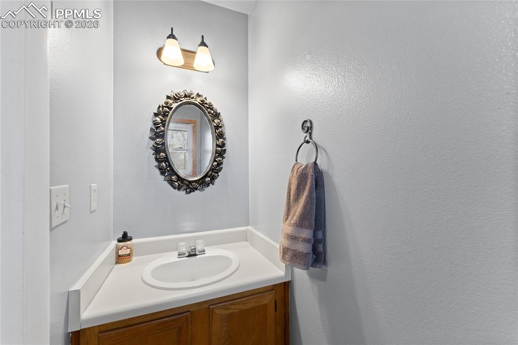 Image 12 of 30: Main level guest bath