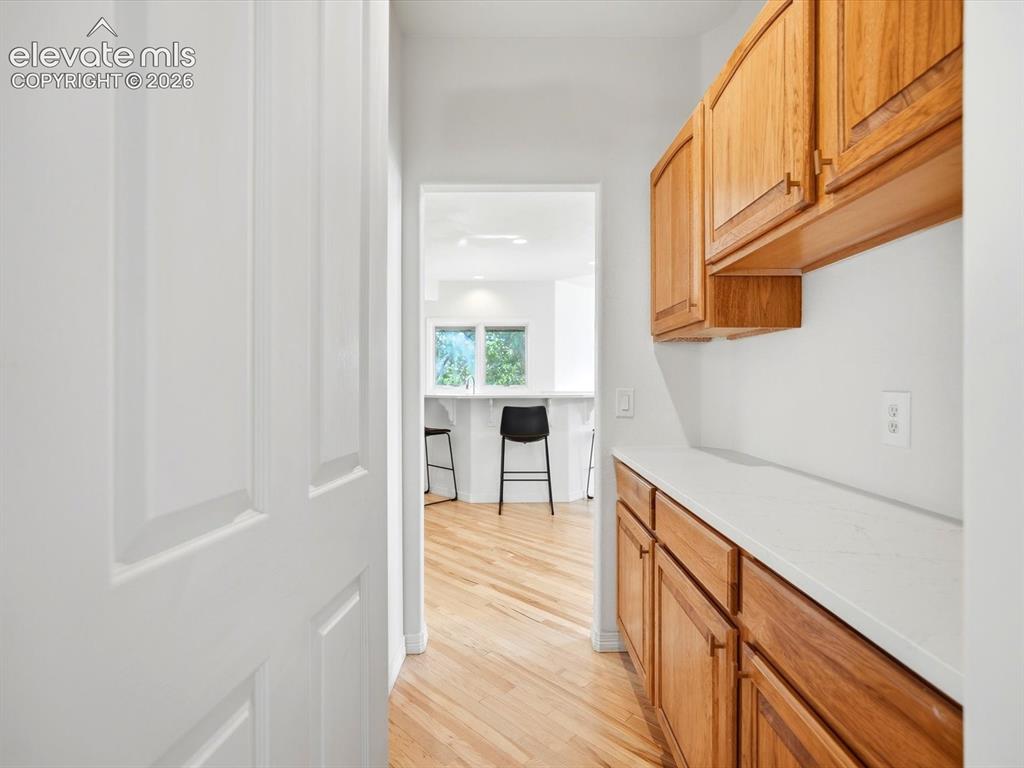 Image 15 of 48: Butler Pantry between kitchen and formal dining room