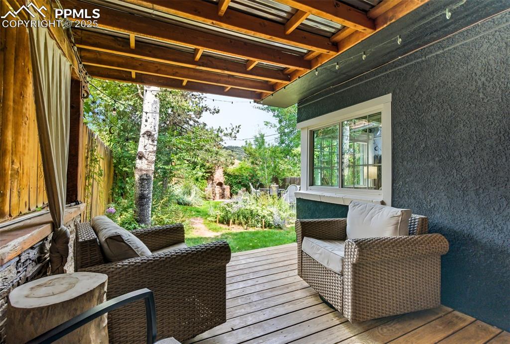 Image 34 of 49: Private deck looking at backyard