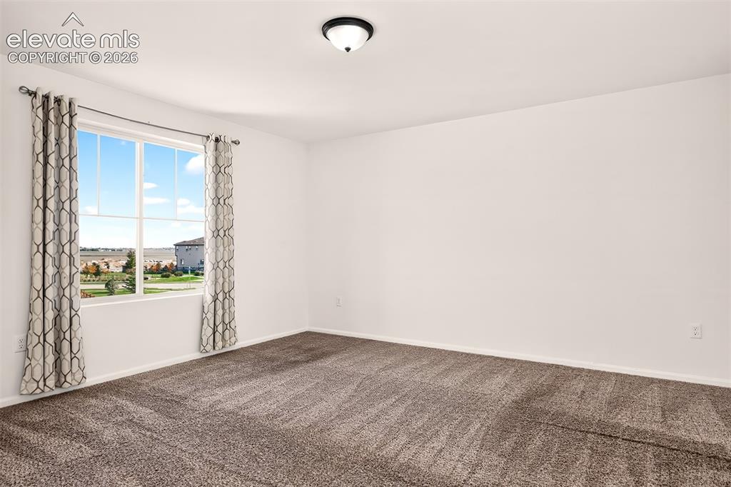 Image 20 of 49: Master Bedroom