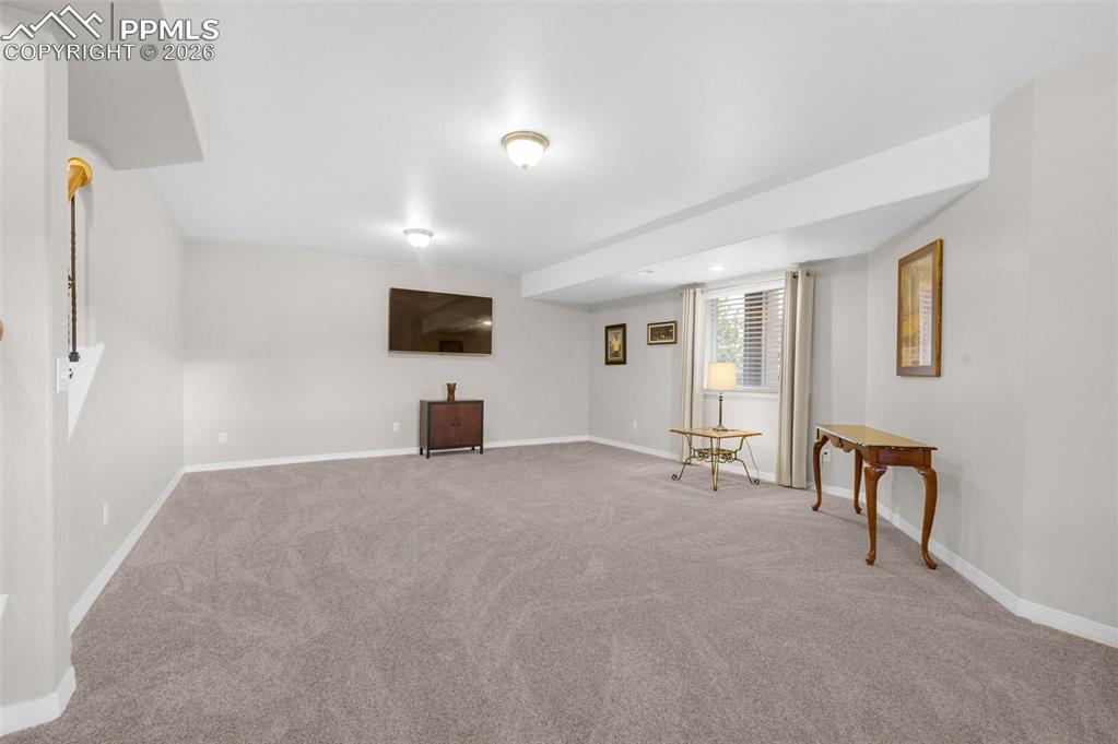 Image 30 of 50: Basement Rec Room