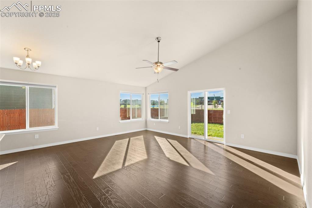 Image 18 of 39: Gather round, this space makes every meal a special occasion.