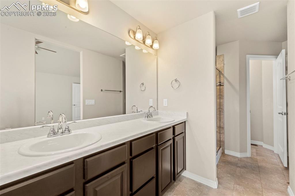 Image 23 of 39: Double sinks = no more toothpaste wars.