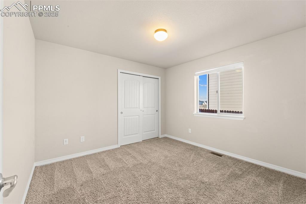 Image 6 of 39: Sleep tight knowing this cozy retreat has your back after a long day.