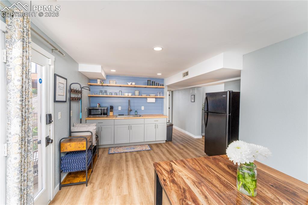 Image 29 of 49: Basement Kitchenette