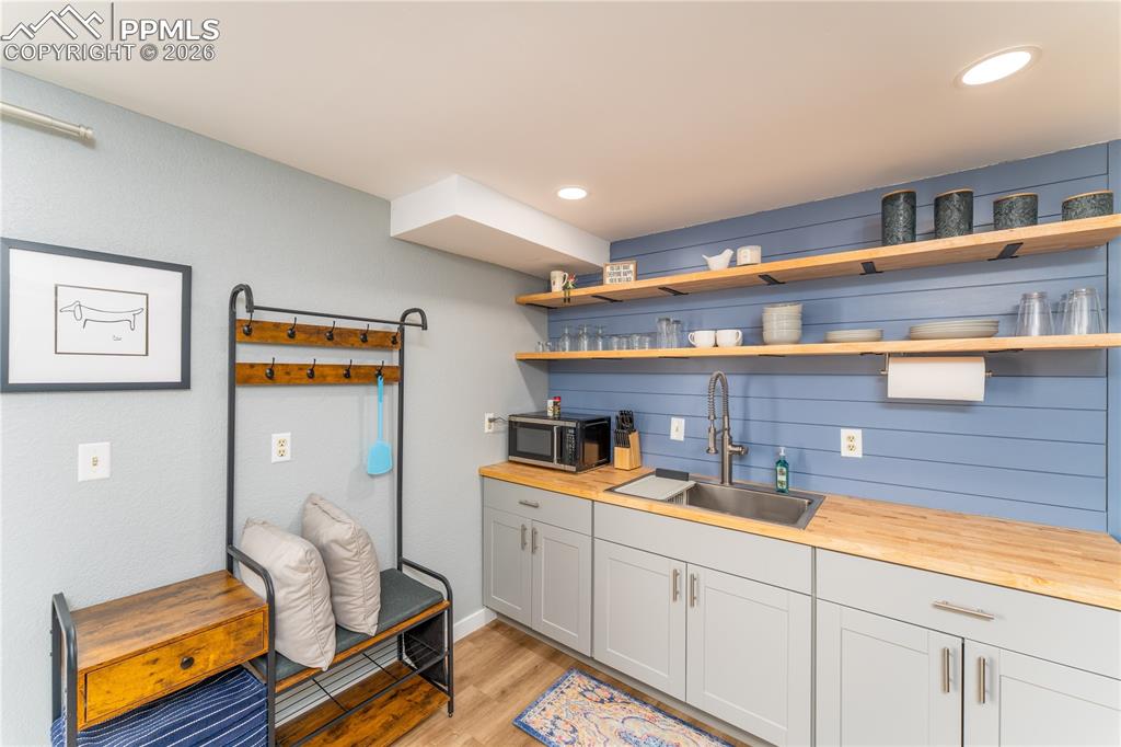 Image 30 of 49: Basement Kitchenette